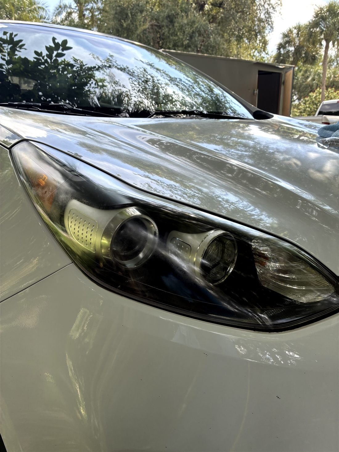 Clear, restored headlight lens after restoration